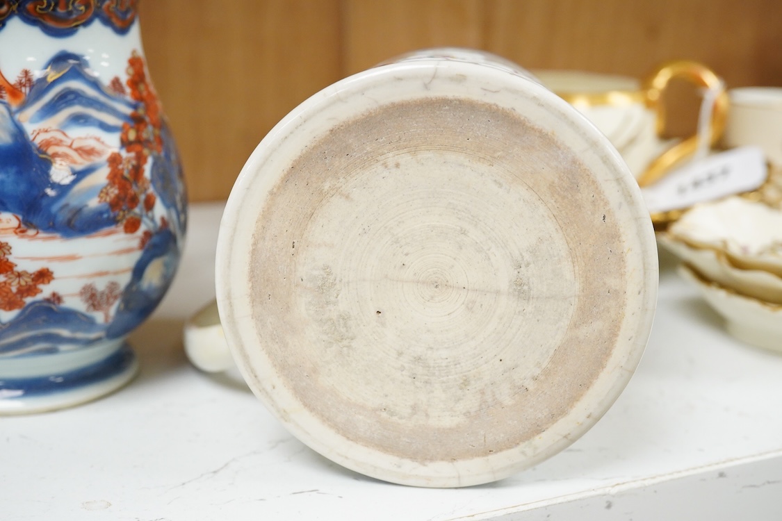 Four 18th century Export and later Chinese mugs to include a blue and white example, (a.f), largest 15cm high